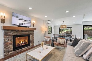 TV, fireplace, books, offices