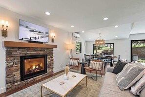 TV, fireplace, books, offices