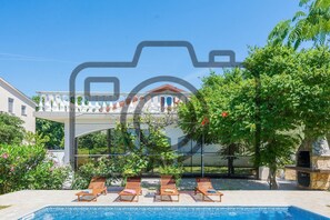 Outdoor pool, pool umbrellas, pool loungers