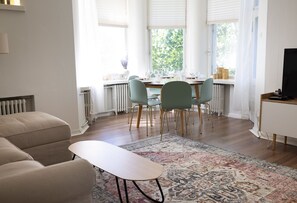 Classic Apartment | Living area | 36-inch TV with cable channels - 2ndhomes Charming 2BR Home w Balcony (Helsinki)