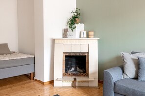 Comfort Apartment | Living area | 32-inch TV with cable channels - 2ndhomes Spacious & Cozy 1BR Home (Helsinki)