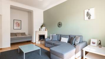 Comfort Apartment | Living area | 32-inch TV with cable channels