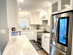 Fridge, microwave, oven, stovetop - 103 Ocean View 2 bedroom 2 bath ground floor (New Smyrna Beach)