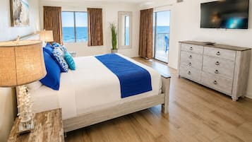 Premium bedding, desk, laptop workspace, iron/ironing board