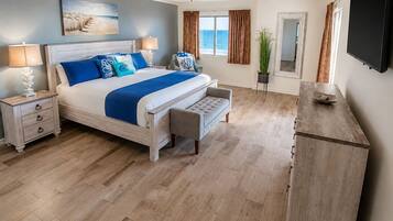 Premium bedding, desk, laptop workspace, iron/ironing board