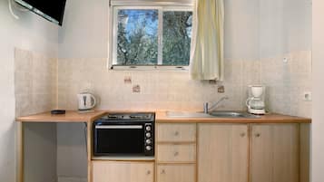 Réfrigérateur, four, plaque de cuisson, cafetiÚre/bouilloire