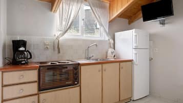 Frigorifero, forno, piano cottura, macchina per tè/caffè