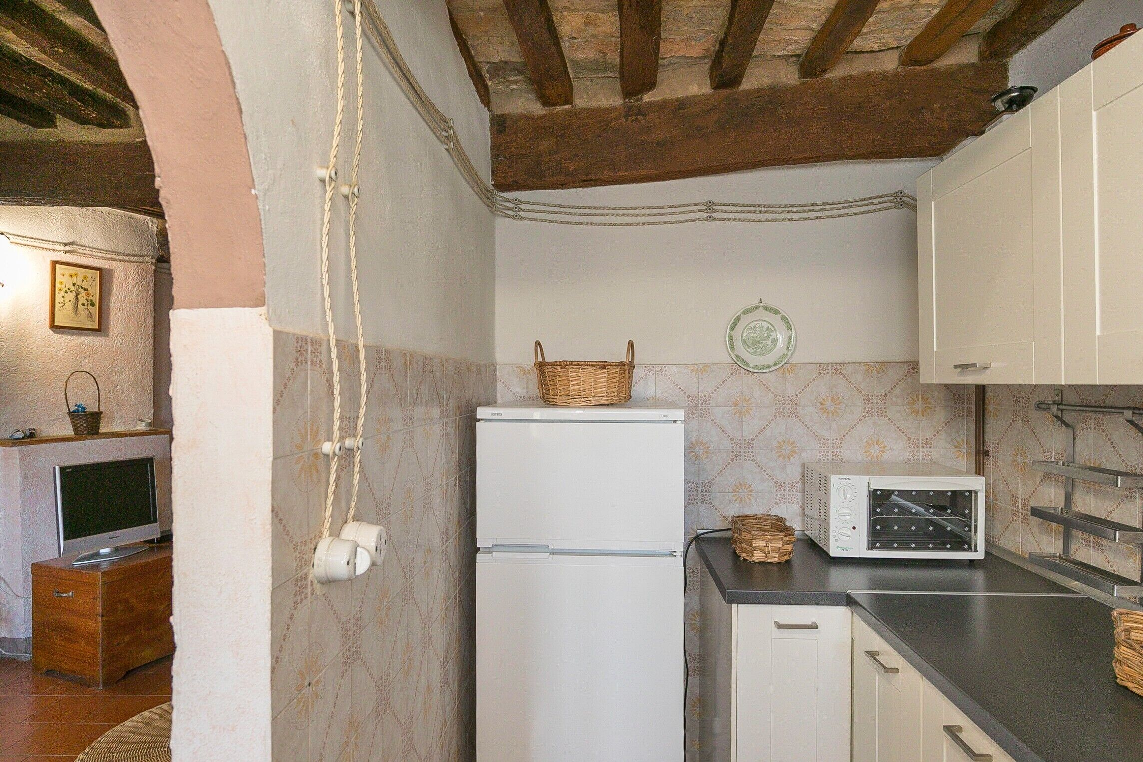 Fridge, stovetop, coffee/tea maker, cookware/dishes/utensils