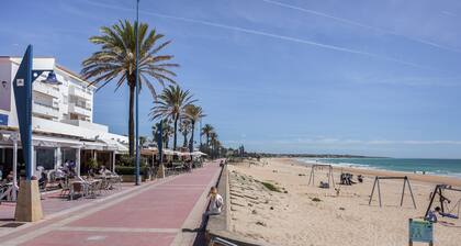 Appartement "Barrosa Primera LĂnea de Playa" avec vue sur mer, piscine et Wi-Fi.