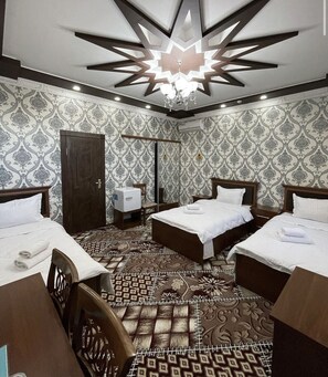 Standard Triple Room | Free WiFi, bed sheets - Vostok Hotel (Kogon)