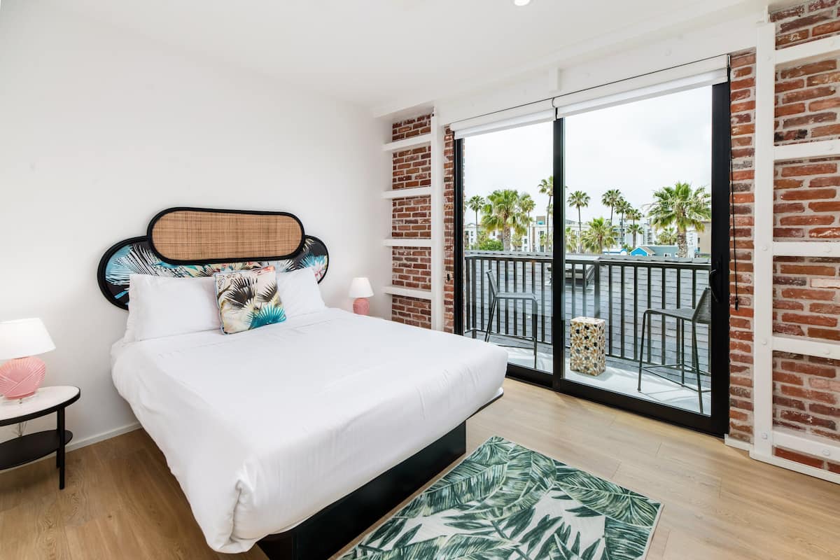 Room, 1 Queen Bed, Balcony, City View (Room 304) | 1 bedroom, in-room safe, individually decorated, individually furnished