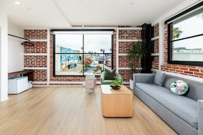 Room, 1 Queen Bed with Sofa bed, City View (Suite 201) | Living area | 40-inch TV with digital channels - The Brick Hotel (Oceanside)
