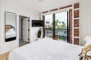 Room, 1 Queen Bed, Balcony, City View (Room 303) | 1 bedroom, in-room safe, individually decorated, individually furnished