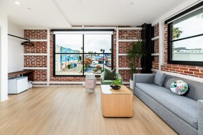 Room, 1 Queen Bed with Sofa bed, City View (Suite 201) | Living area | 40-inch TV with digital channels - The Brick Hotel (Oceanside)