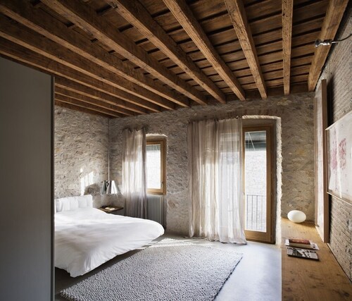 Historical stone house renovated with modern style 