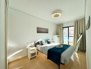 2 dormitorios, tabla de planchar con plancha, wifi gratis y ropa de cama