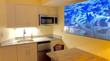 Fridge, microwave, cookware/dishes/utensils