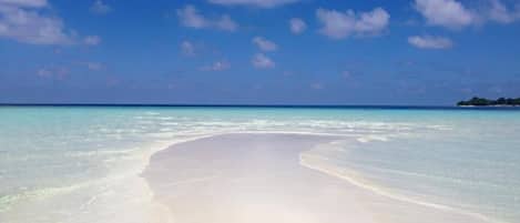Private beach nearby, white sand, beach umbrellas, beach towels