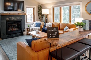 Smart TV, fireplace, books