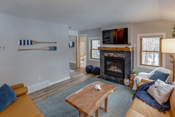 Smart TV, fireplace, books