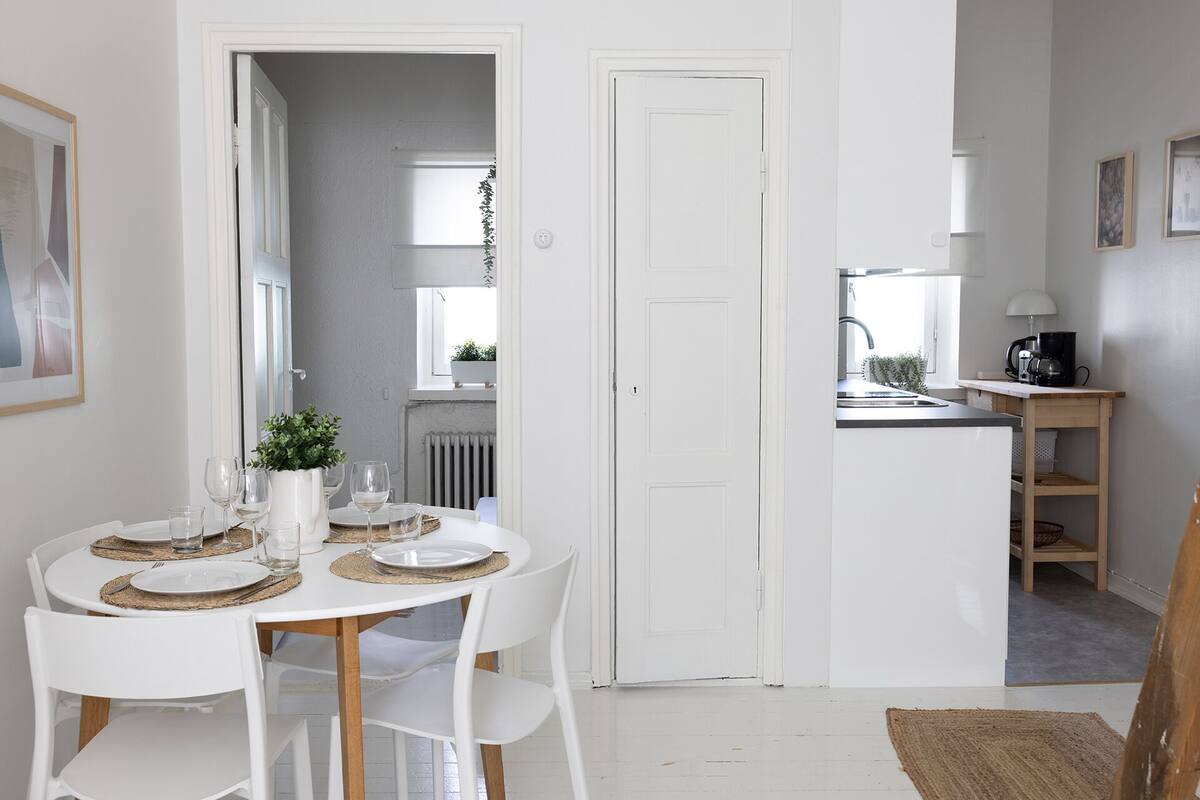 Estudio Confort | 1 habitación, tabla de planchar con plancha y ropa de cama