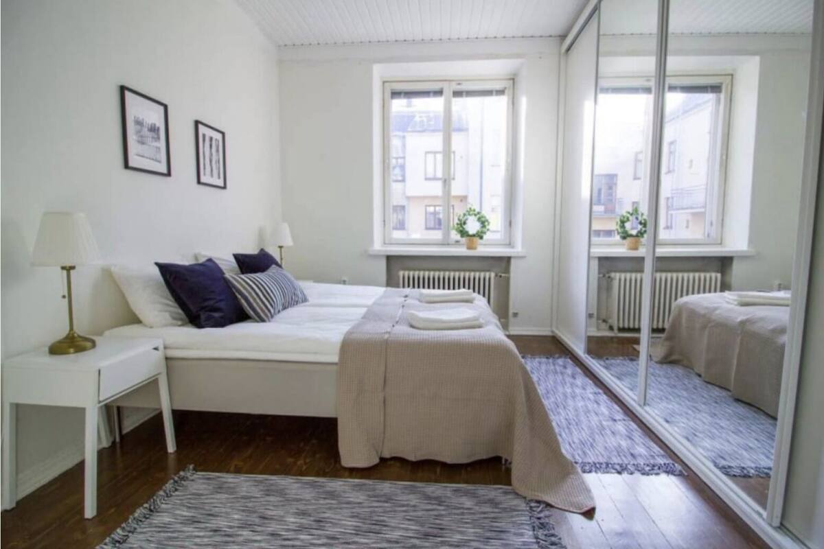 Departamento Confort | 1 habitación, tabla de planchar con plancha y ropa de cama