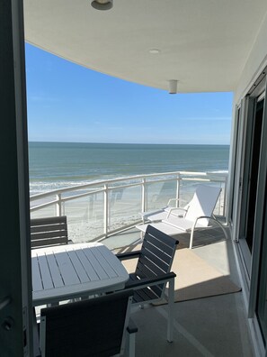 Outdoor dining - Stunning Beach Front 3 Bedroom Condo Sand Key, Clearwater. Heated Pool & Hot Tub (Clearwater)