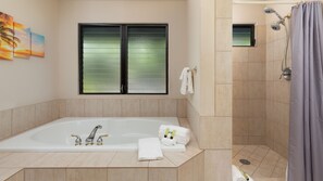Combined shower/bathtub, towels, soap, shampoo