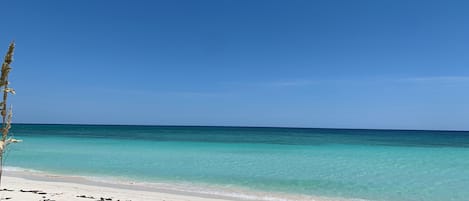 On the beach, sun-loungers, beach towels