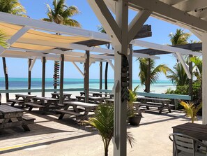 Outdoor dining - Ground floor condo with private beach.   Pet friendly  (Freeport)