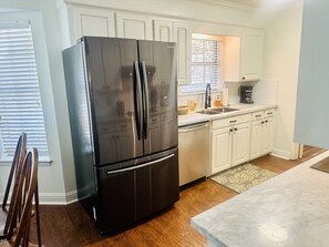 Fridge, microwave, oven, stovetop - The BAY HOUSE at the REZ, 4 bdrm 2 ba (Brandon)
