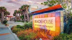 A waterfront restaurant sign with 'BEACH HOUSE' and 'WATERFRONT RESTAURANT' text. - House has power ,Fast WIFI，Near Anna Maria beach (Bradenton)