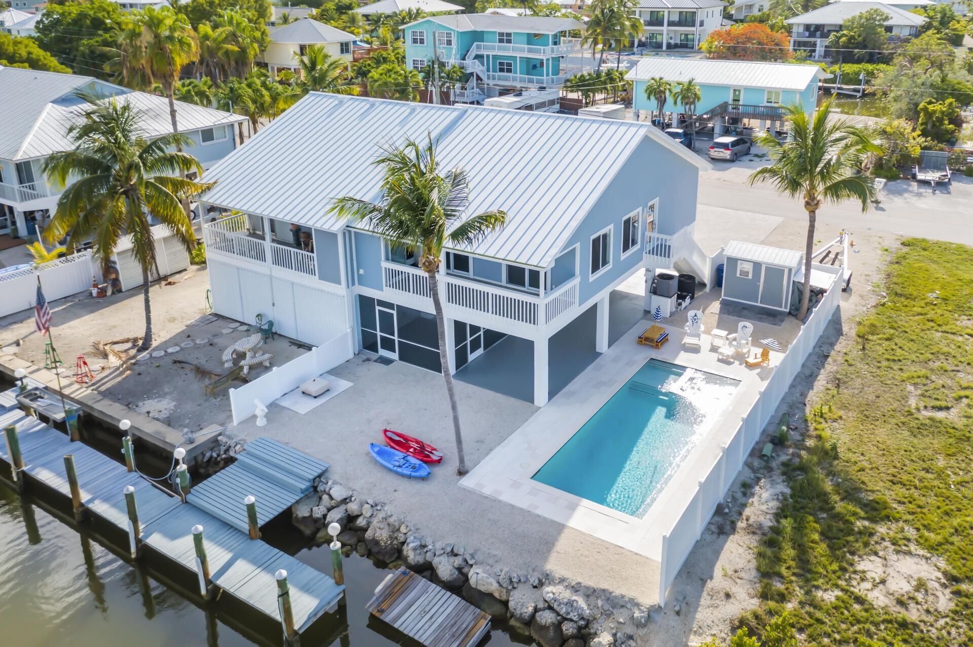 Blue Chair Haven, canal front, pool, close to Sombrero Beach <br>Vaca-23-3