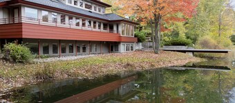 Mid-Century Modern Retreat on Private 10 Acres with 1-Acre Pond & Nature Trails.