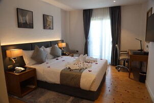 Deluxe Room | In-room safe, desk, laptop workspace, iron/ironing board