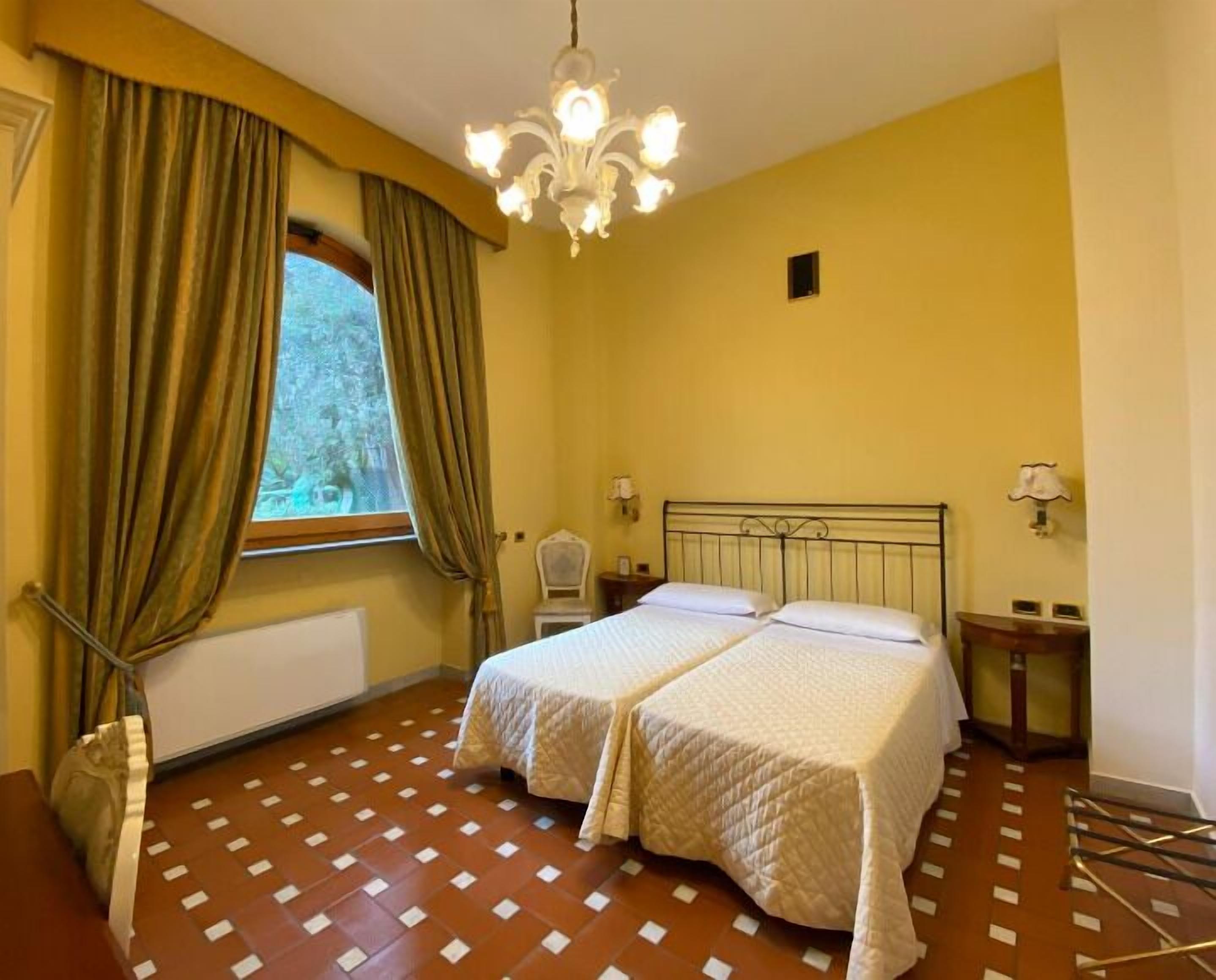 Quarto duplo clássico (Con Accesso Disabile) | Roupas de cama antialérgicas, frigobar, cofres nos quartos