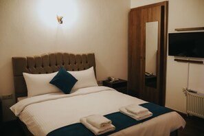Habitación doble Deluxe | Sábanas de algodón egipcio, ropa de cama de alta calidad y minibar 