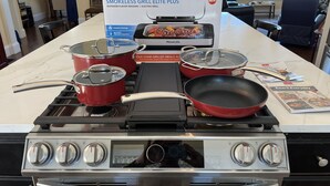 A kitchen with a PowerXL Smokeless Grill Elite Plus, pots, pans, and a cookbook on the counter. - Couples Villa Retreat w/85” Sony HD 8K TV Pool table New Jacuzzi Spa & Game room (Conway)