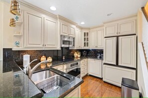 Fridge, microwave, oven, stovetop - Penthouse Condo, ocean view, steps to the beach (Cape Canaveral)