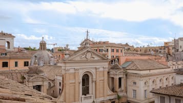 A historic building with classical architecture, including a dome and ornate details.