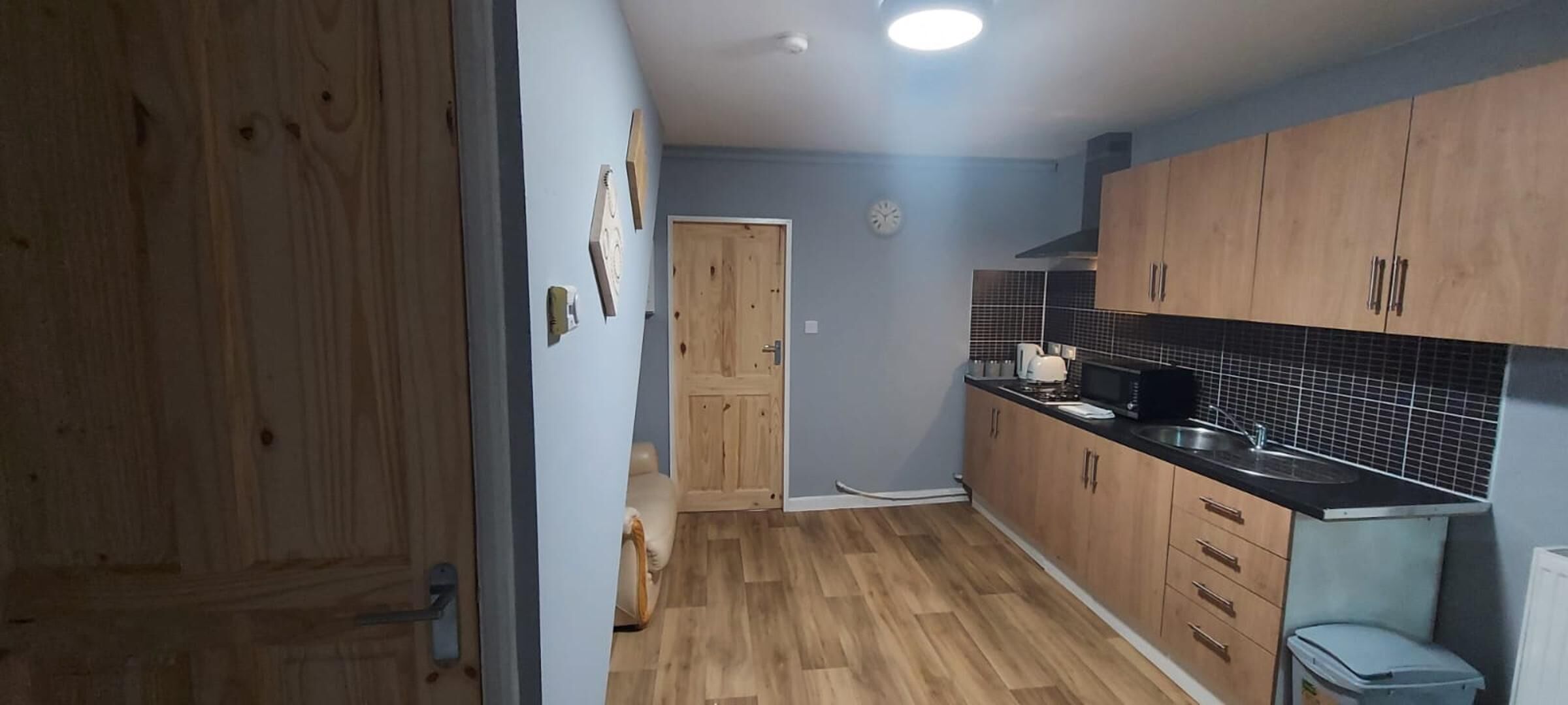 Apartment, Multiple Beds | Private kitchen | Fridge, microwave, stovetop, electric kettle