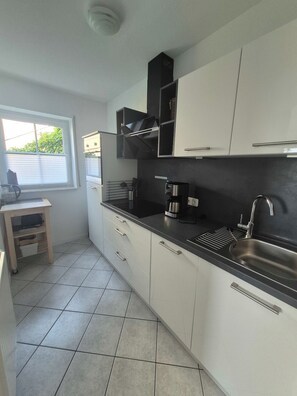 Oven, stovetop, dishwasher, coffee/tea maker