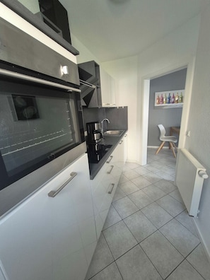 Oven, stovetop, dishwasher, coffee/tea maker