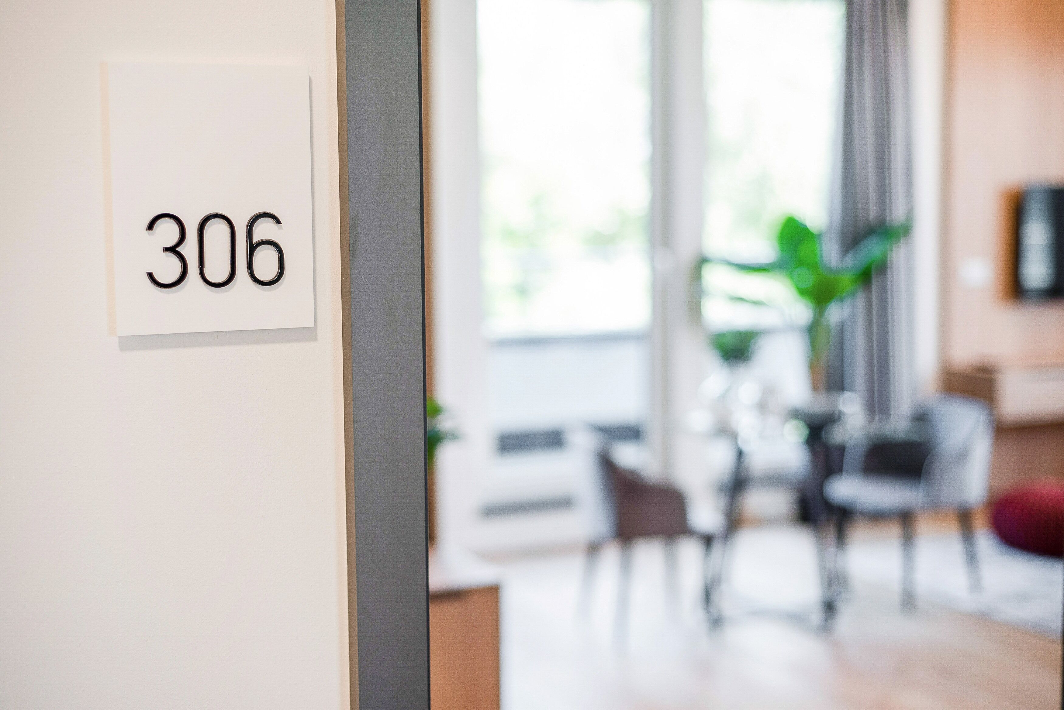 A room with a door labeled '306'.