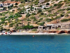 On the beach, sun loungers, beach towels