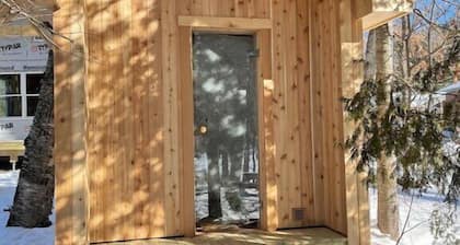 Lakefront Cabin - dock, beach, sauna, and views!