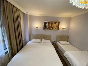 Habitación Deluxe | 1 habitación, wifi gratis y ropa de cama
