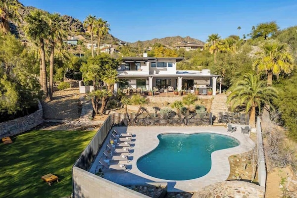1.5-acres of desert bliss with native plantings, saguaro and Mountain View’s, lush lawn (with corn hole), a resort-worthy pool area, and plenty of loungers.