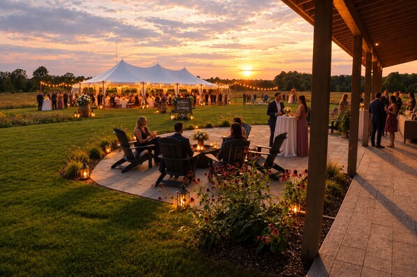 An outdoor event with tents and tables set up for guests.