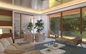 Relax in a serene space with a view of lush greenery, featuring a comfortable seating area and large window.